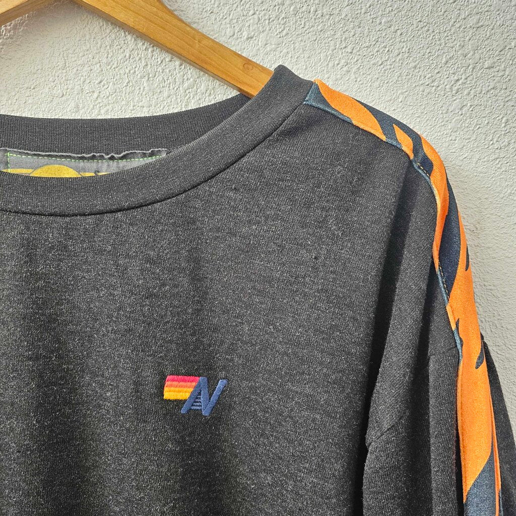 Crew neck tiger stripes on sleeve