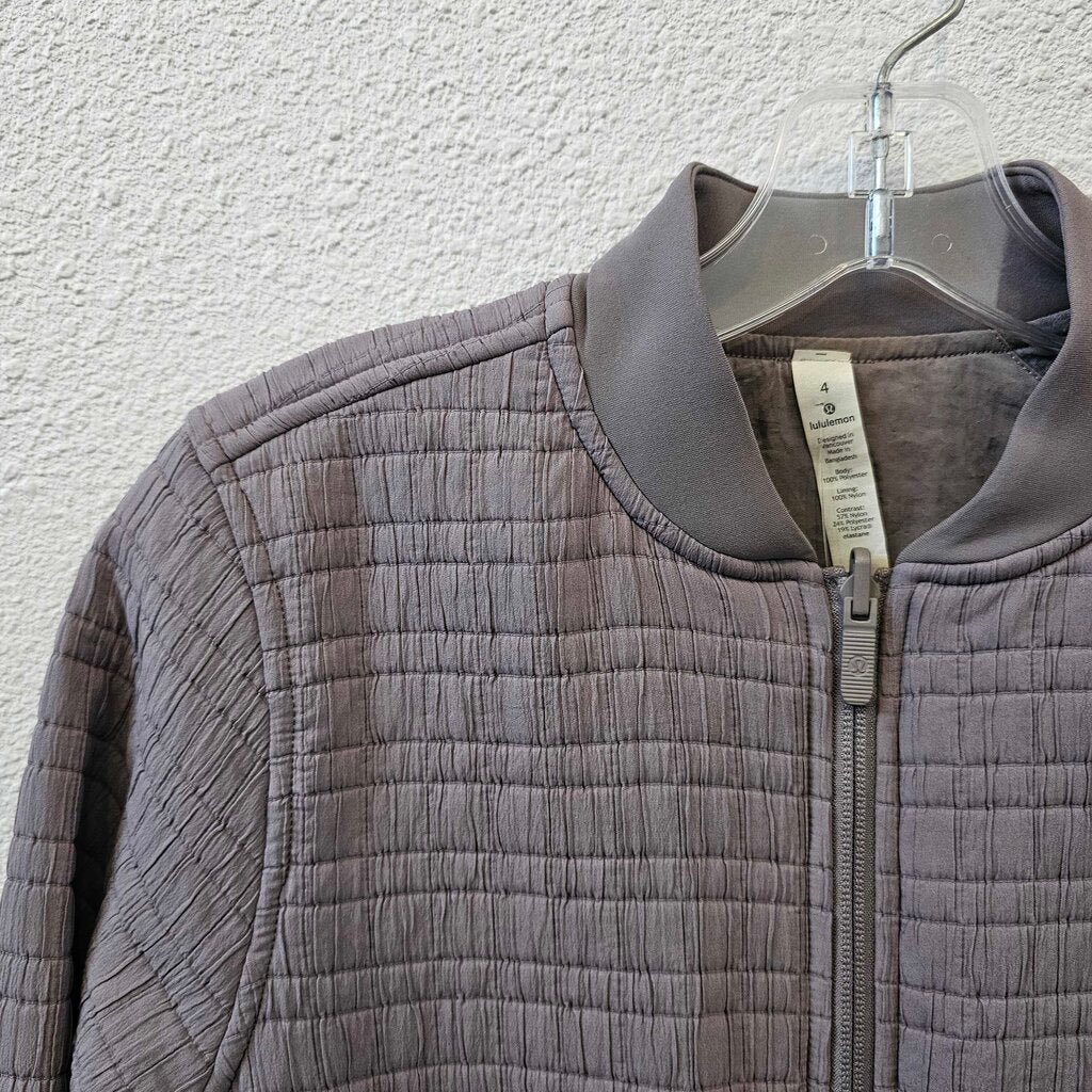 Textured bomber jacket zip