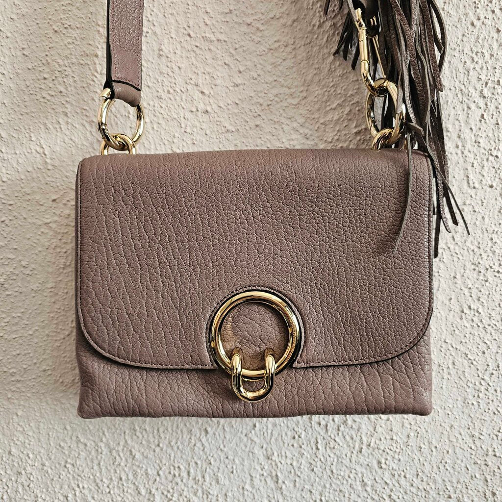 Leather with Fringe on Strap
