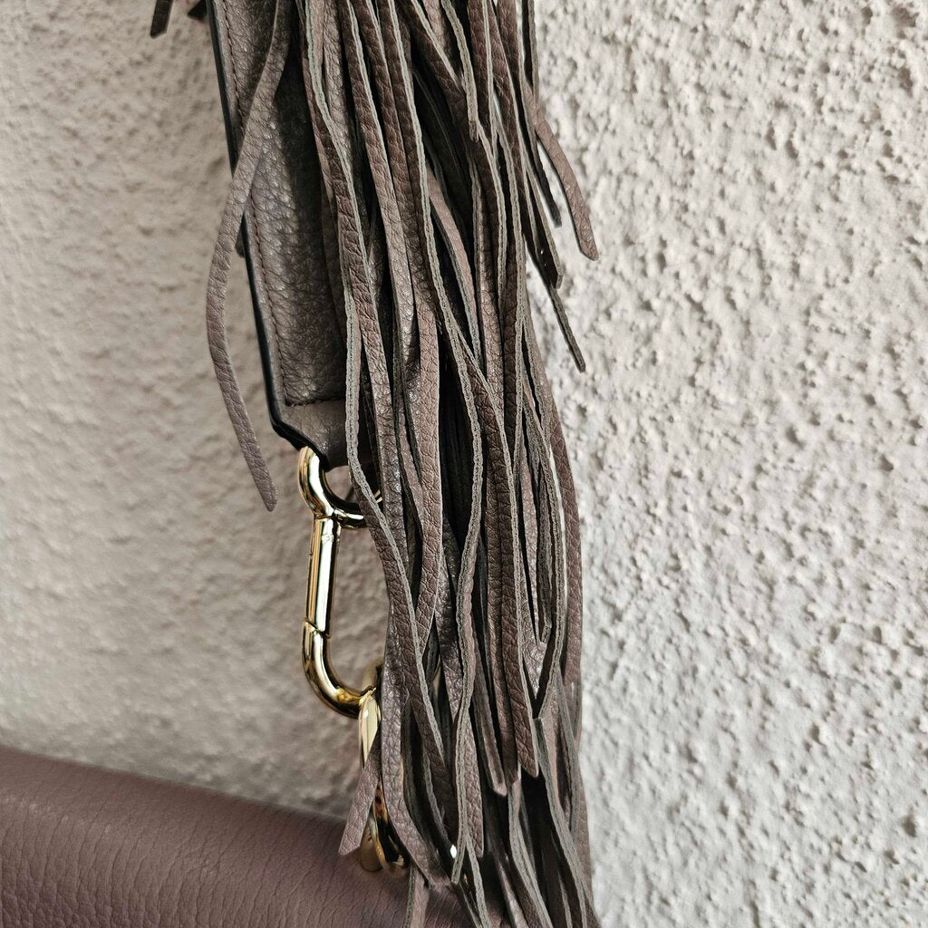 Leather with Fringe on Strap