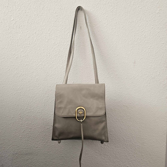 Leather turn lock backpack