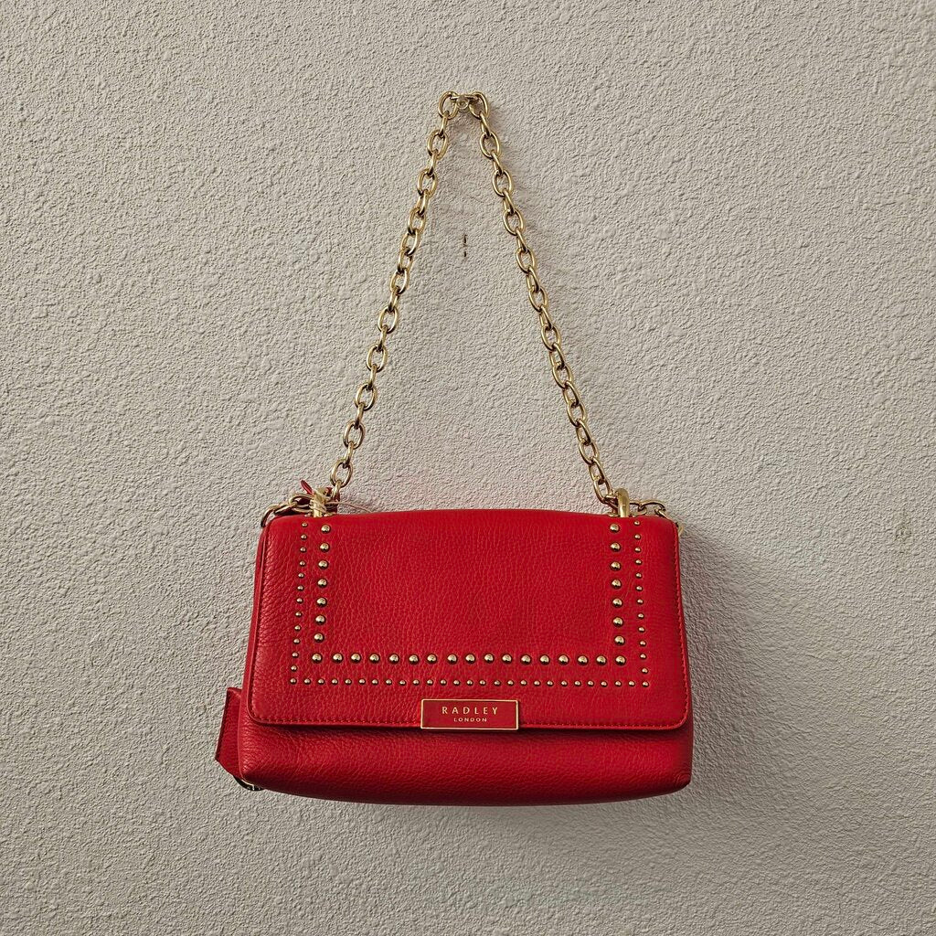 Red leather crossbody with gold hardware